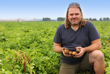 Andy Diercks in potato field